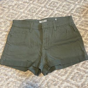 Olive green shorts, high rise and stretchy